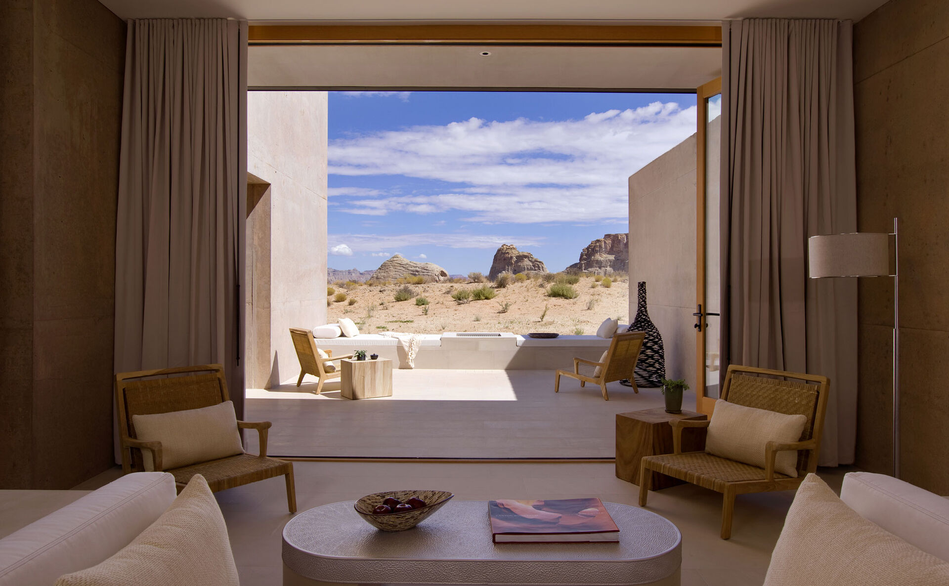 Open desert suite looking out to sandstone buttes at midday