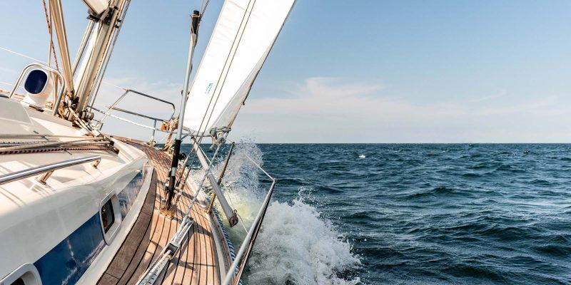 A yacht under sail on open sea